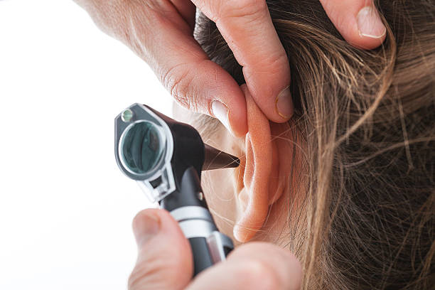 ear with an otoscope